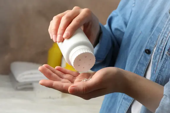 Consumer using talcum powder