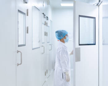 Microbiologist Entering Clearnoom