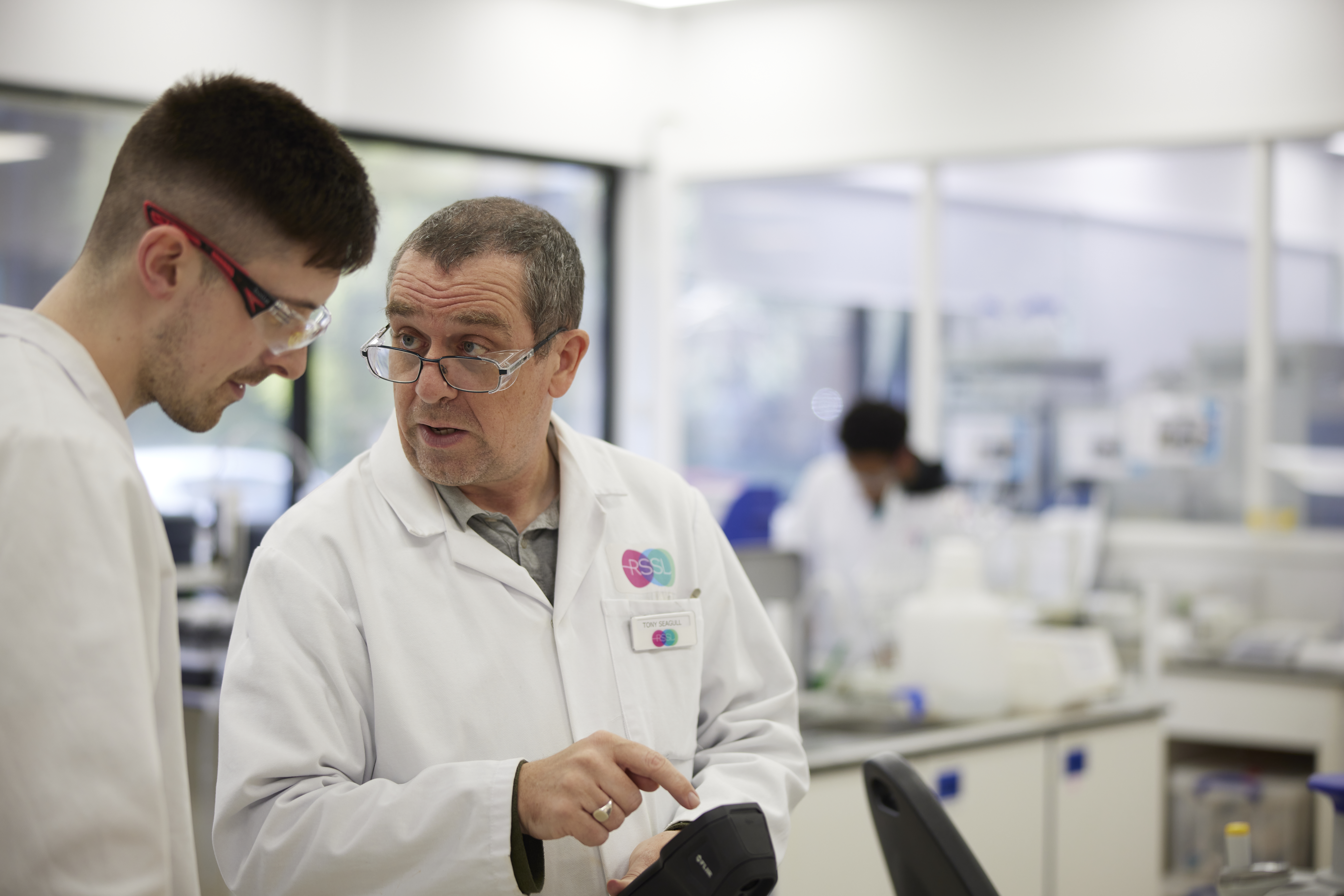 Two scientists using a risk based decision making process