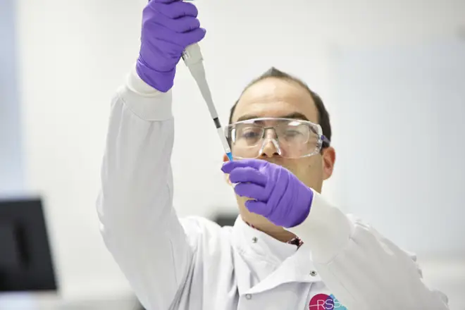 Scientist performing bioassay