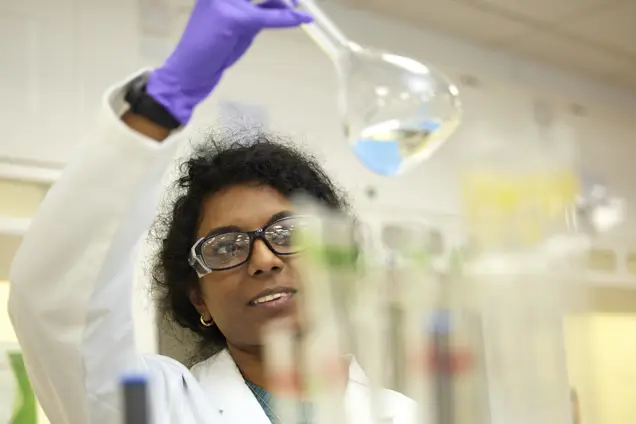 Scientist examining a liquid sample