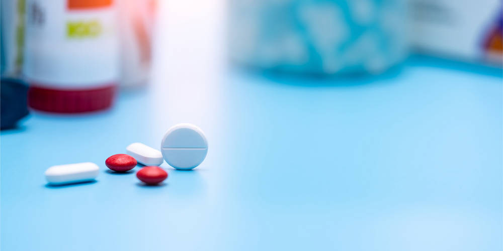 Tablet On Blue Surace Tablet On Blue Surace